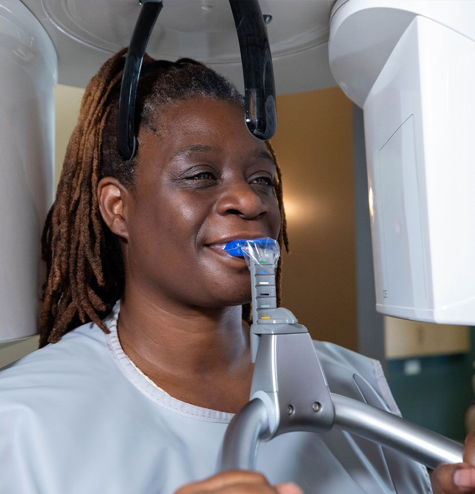 Patient undergoing a cbct scan for their dental implant procedure