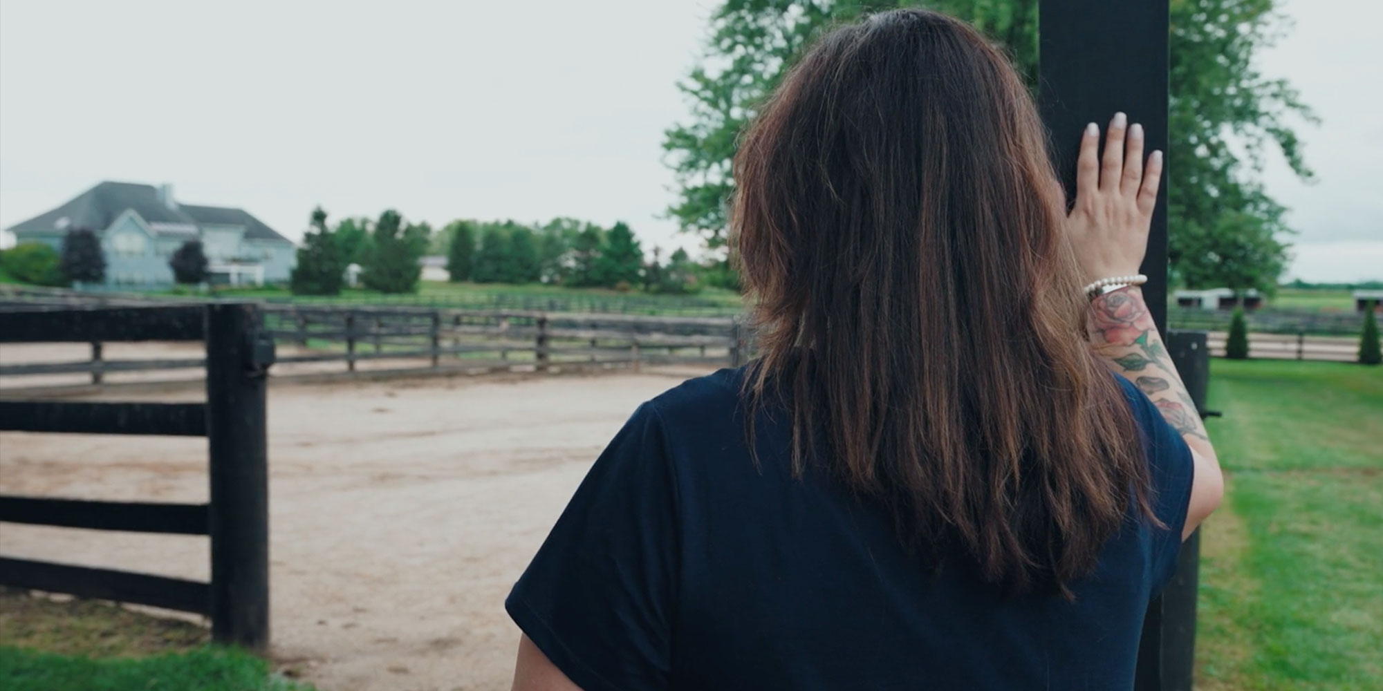 dental implant patient looking out on a large set ranch